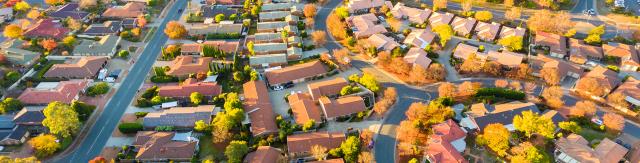 Aerial view of a typical Australian suburb with autumn colours