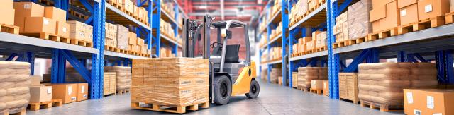Concept of warehouse. The forklift between rows in the big warehouse.